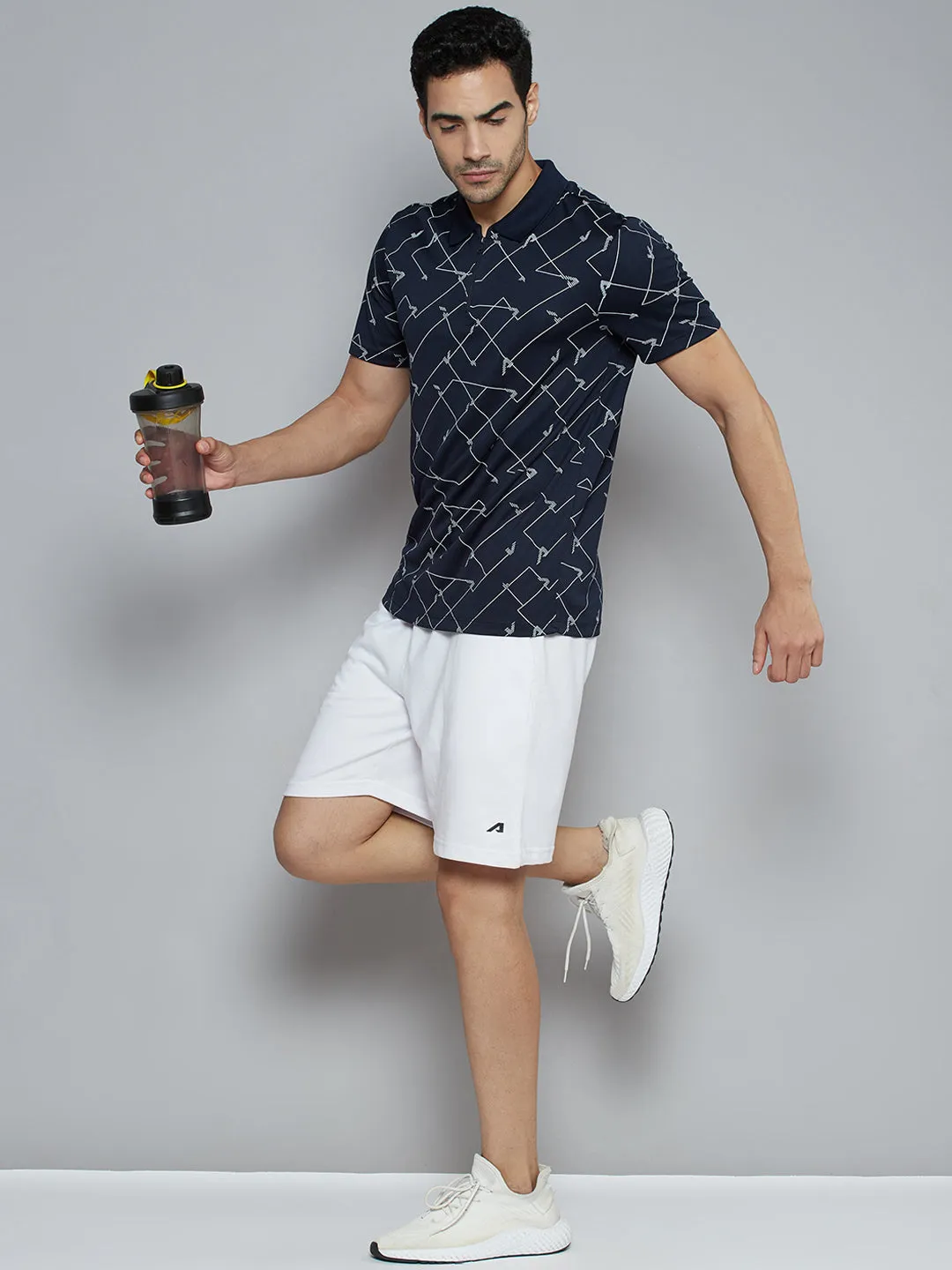 Alcis Men Navy Blue Abstract Printed Polo Collar Slim Fit T-shirt