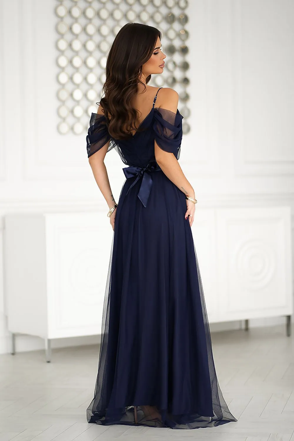 Beautiful long Spanish-style evening dress with plunging tulle sleeve