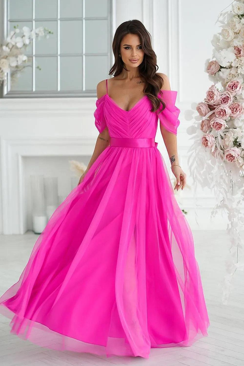 Beautiful long Spanish-style evening dress with plunging tulle sleeve