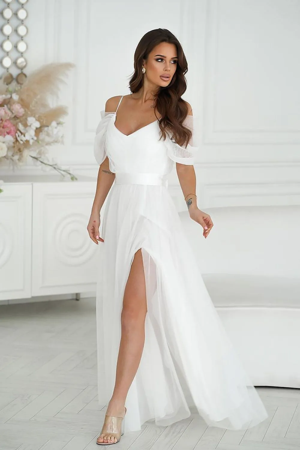 Beautiful long Spanish-style evening dress with plunging tulle sleeve