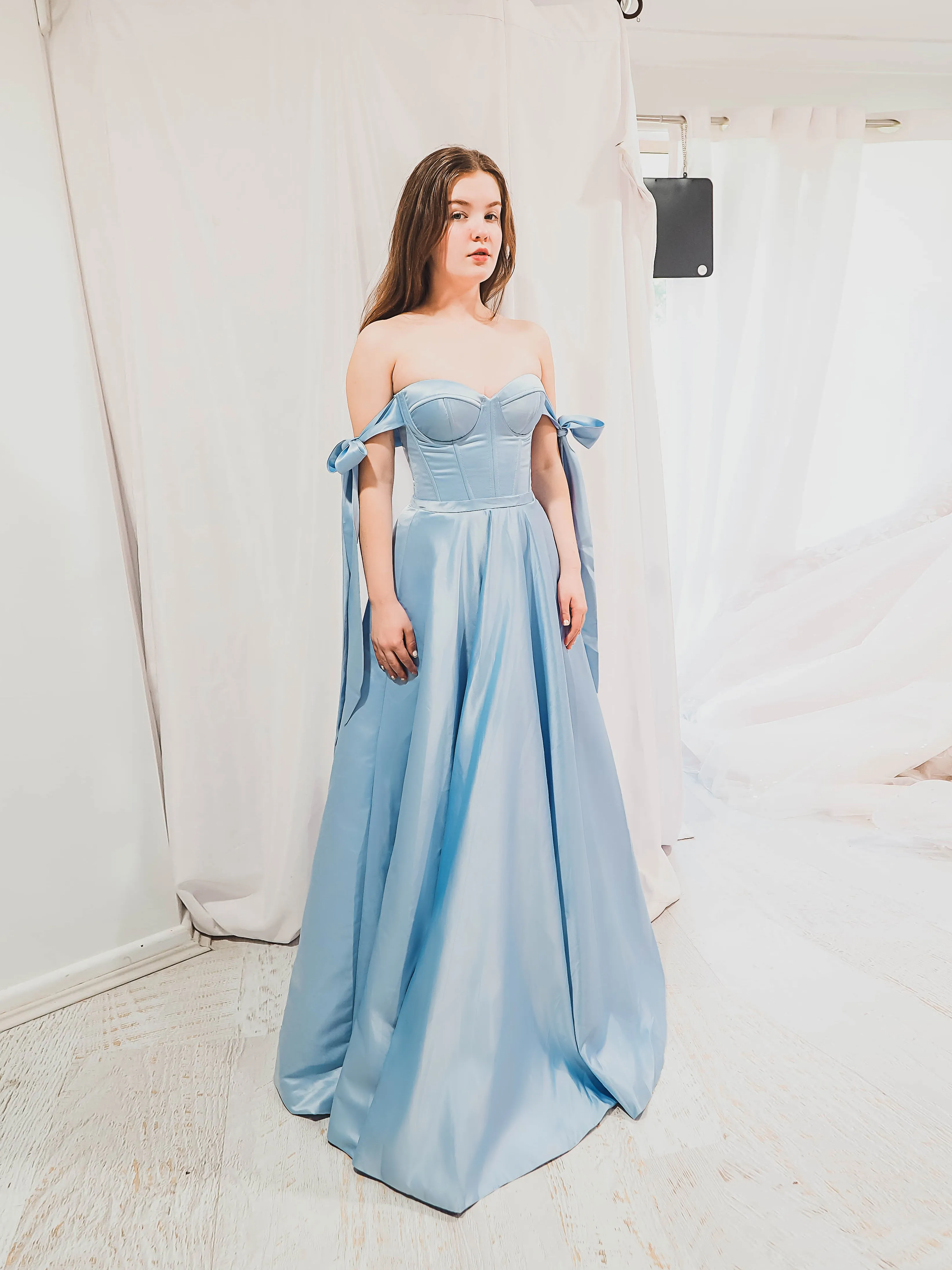 Bustier corset baby blue dress with self-tie bows for hire