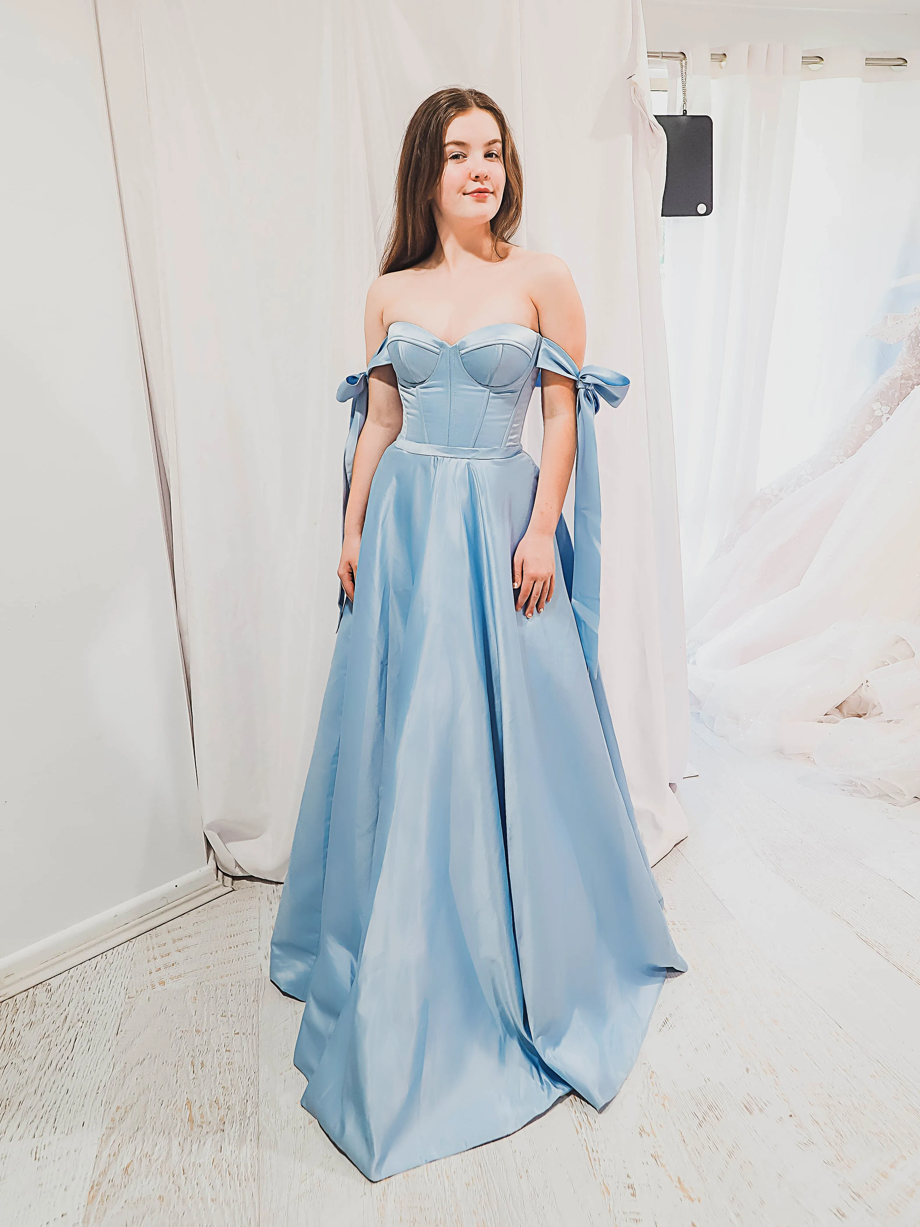 Bustier corset baby blue dress with self-tie bows for hire