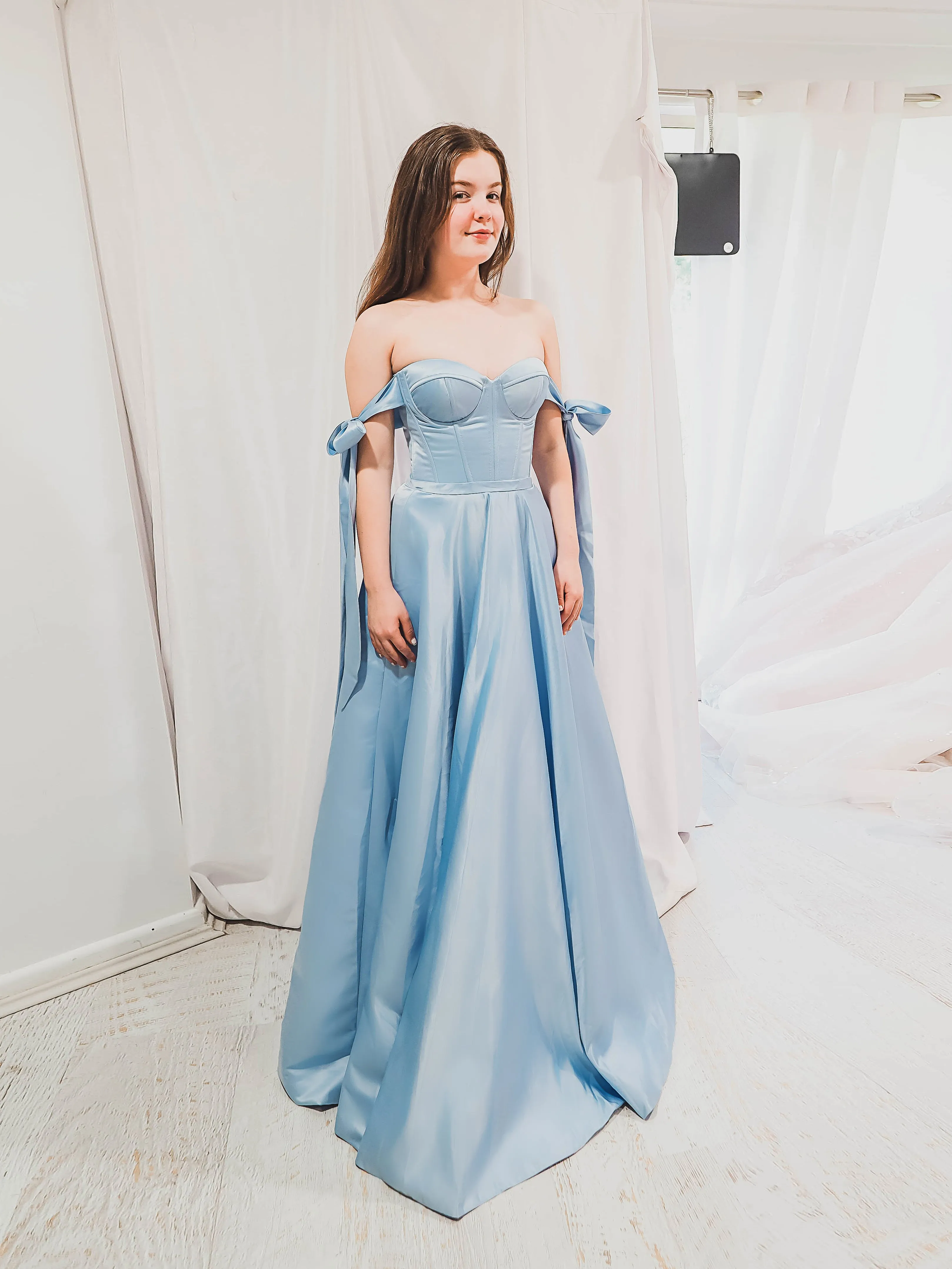 Bustier corset baby blue dress with self-tie bows for hire