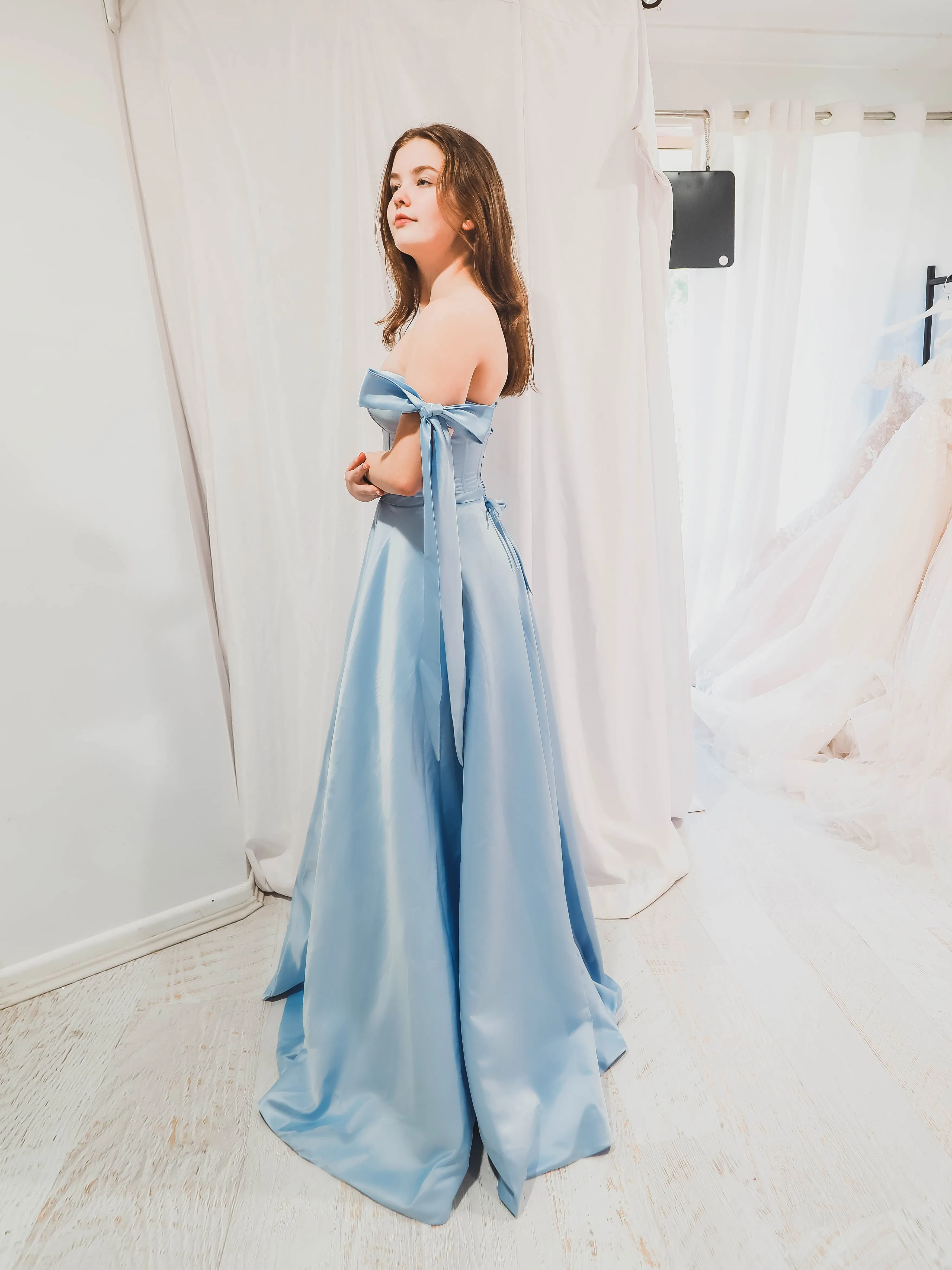Bustier corset baby blue dress with self-tie bows for hire