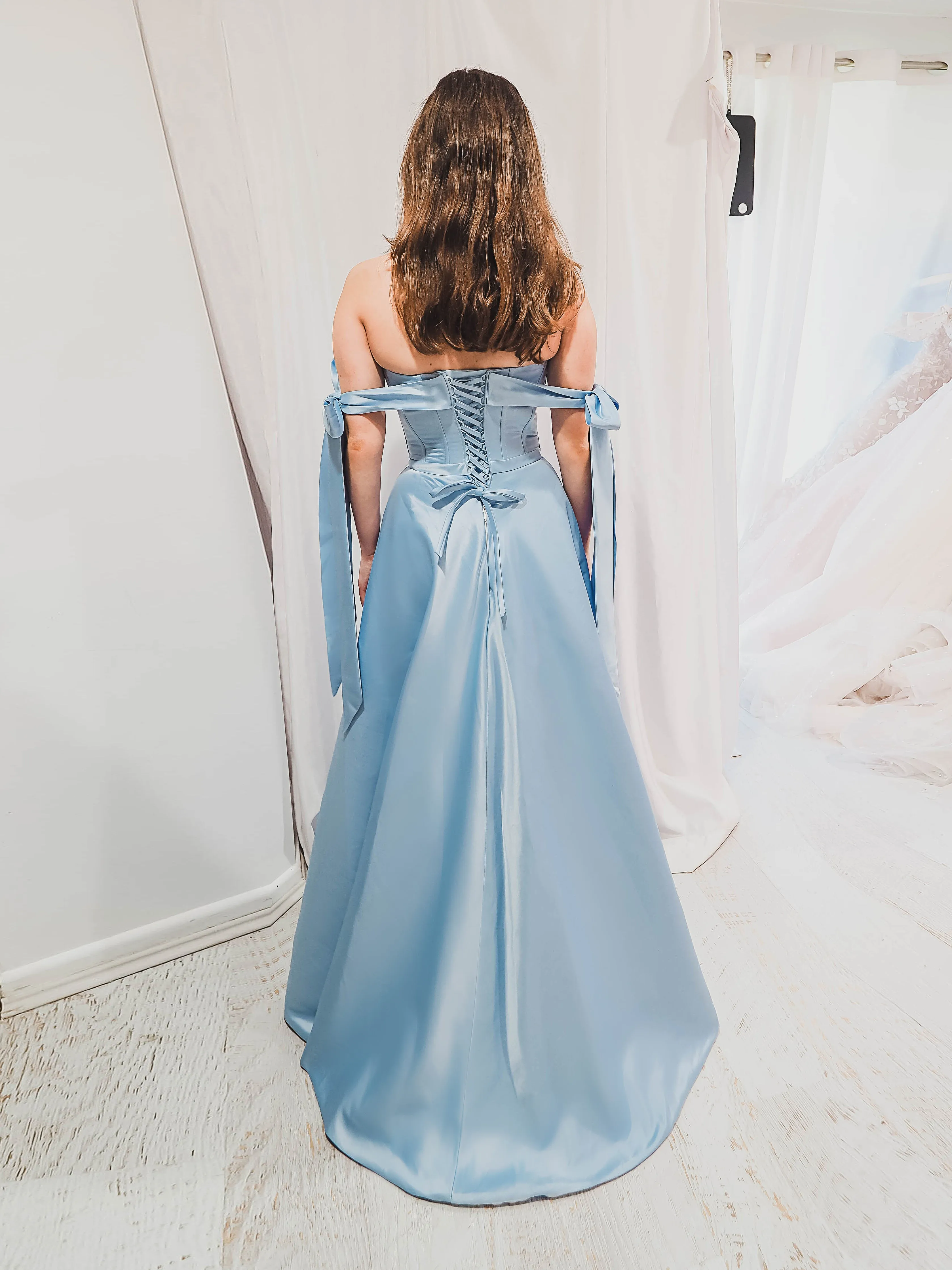 Bustier corset baby blue dress with self-tie bows for hire
